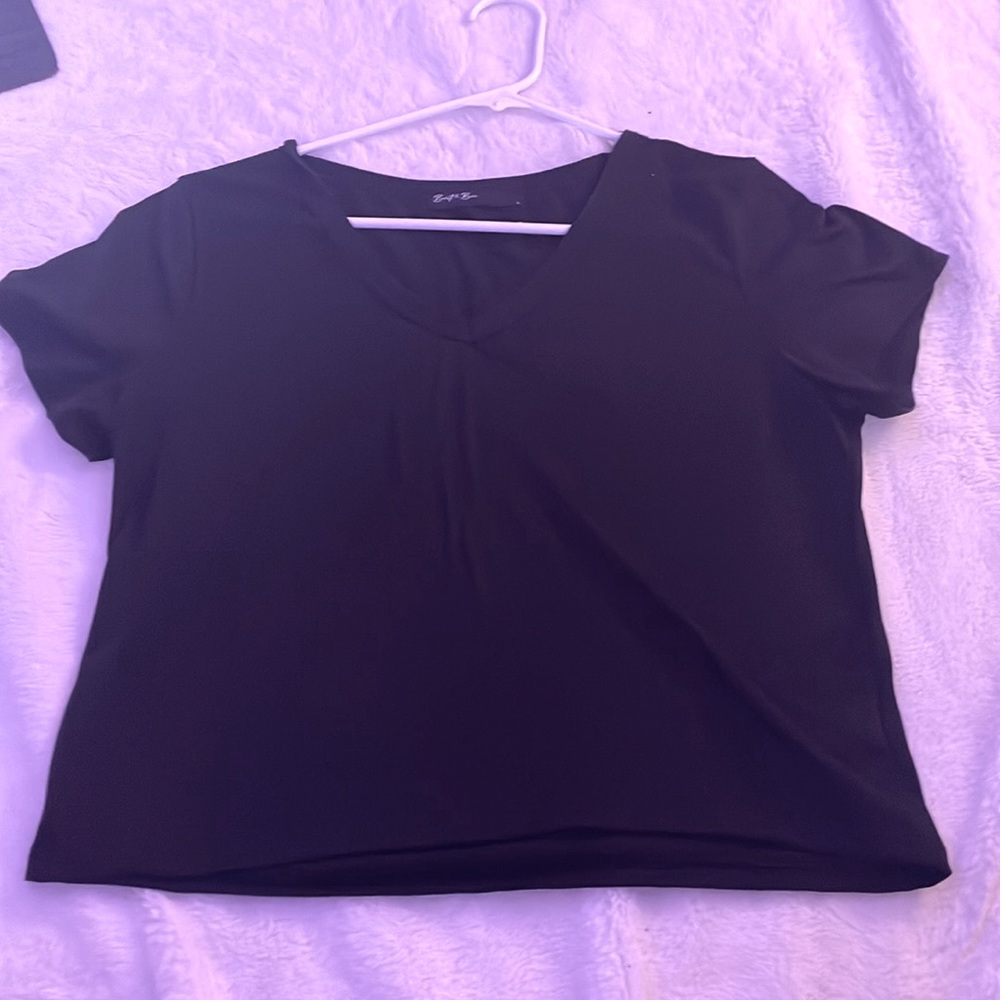 Black loose crop top, V-neck, very soft, hardly been worn.